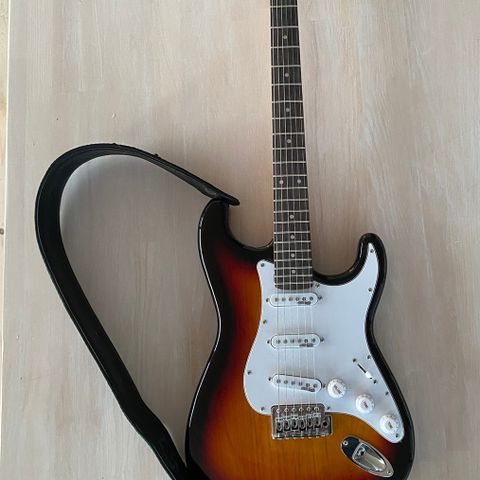 gitar med stativ og forsterker