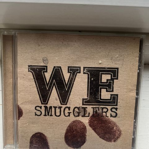 We – Smugglers (CD)