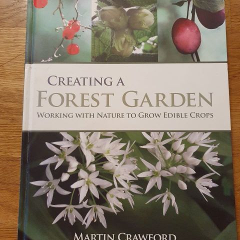 "Creating a Forest Garden" by Martin Crawford.