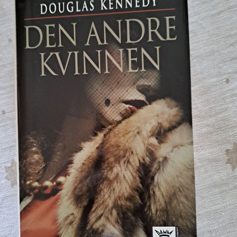 Boka" DEN ANDRE KVINNEN "