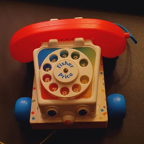 Fisher Price Telefon - Beveger øynene når man drar den etter seg