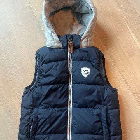 vest 110 116