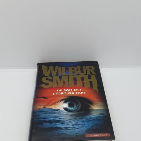 1.opplag. De som er i storm og fare - Wilbur Smith