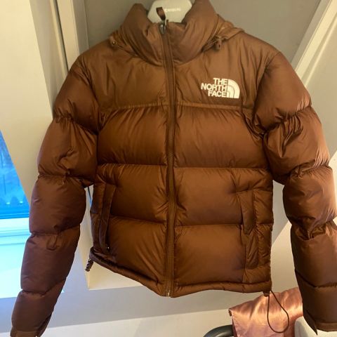 brun north face puffer jacket