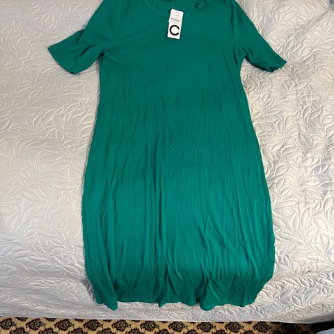 Ny grønn pen kjole