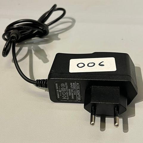 AC/DC adapter 12V 1A model 1210