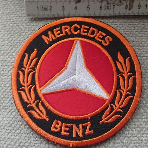 Mercedes Benz logo tøymerke oransj rødt selges