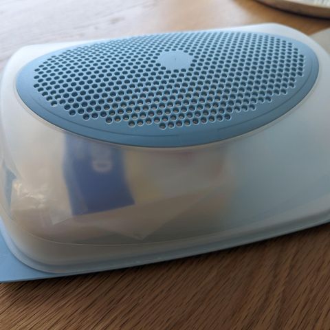 Osteklokke fra Tupperware