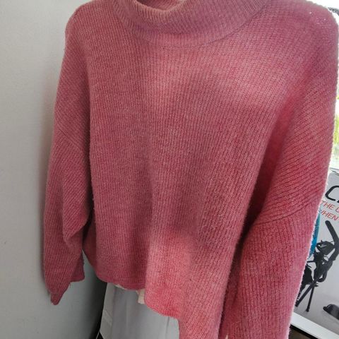 Rosa strikkegenser