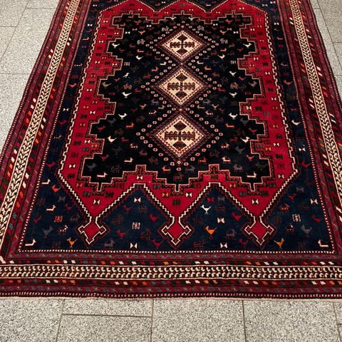 Håndknyttet persisk teppe