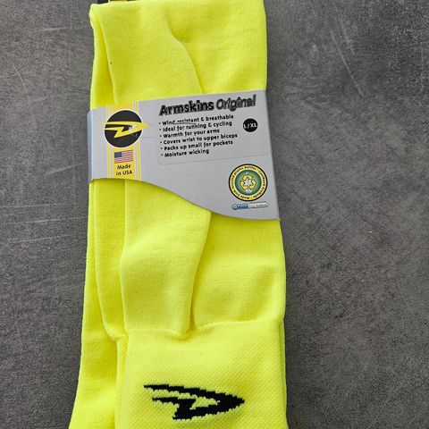 Defeet armskins neongul str L/XL