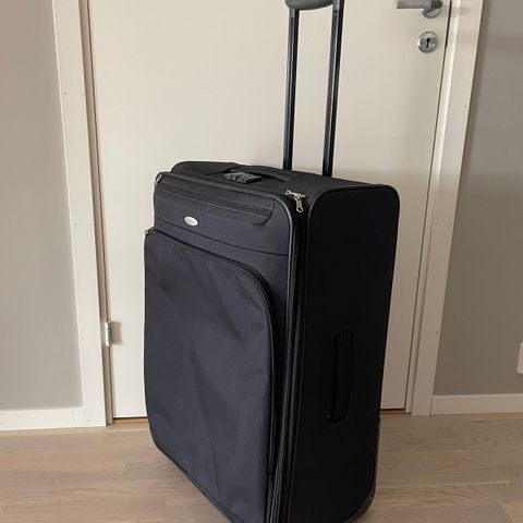 Stor koffert til ferie? Samsonite utvidbar trillekoffert med hjul