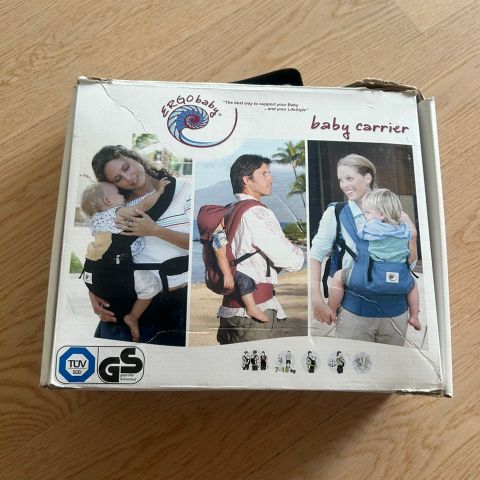 Selger en ubrukt baby carrier