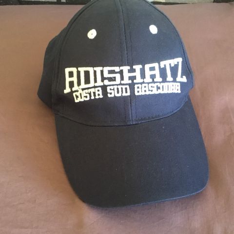 caps Adishatz
