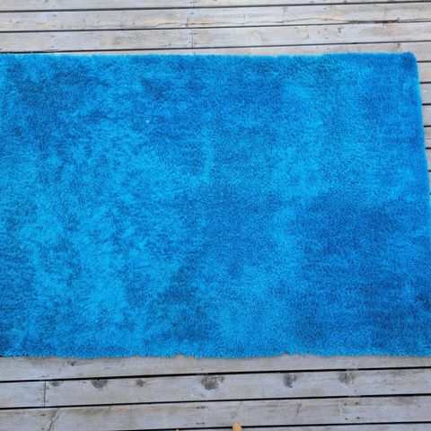 Blått teppe 130x190cm