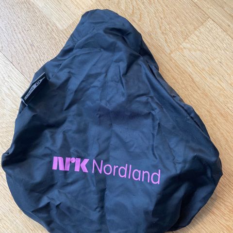 Regntrekk til sykkelsete m/ Nrk Nordland-logo
