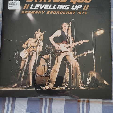 Status quo:Levelling up,vinylplate.Uåpnet.