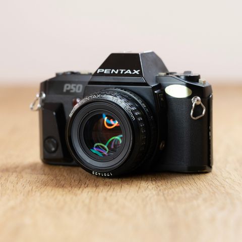 Pentax P50 analogt kamera med SMC Pentax-A 1:1.7/50mm normalobjektiv