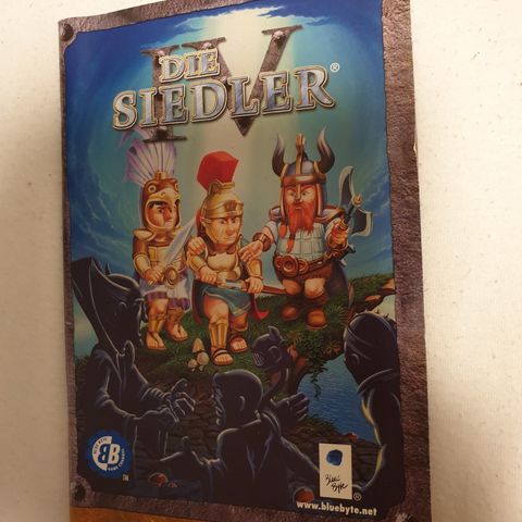 Die Siedler håndbok på tysk