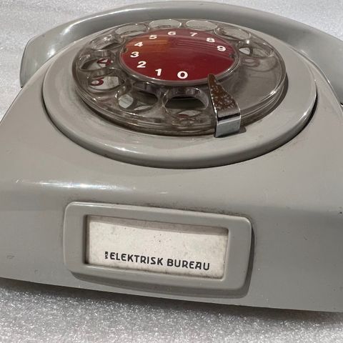 Telefon med plystrelyd