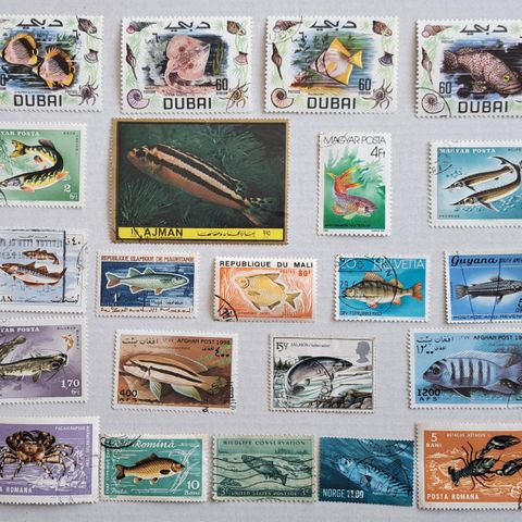 FISK. 22 forskjellige frimerker fra diverse land, med fisk som motiv.