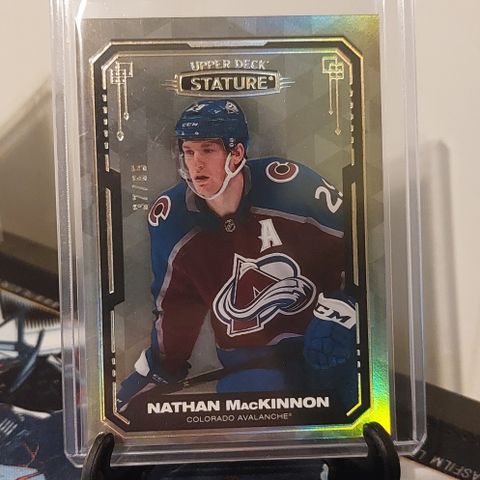 2021-22 Upper Deck Stature Hockey - Nathan Mackinnon Design Variant #/65