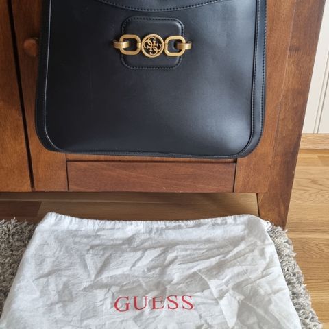 GUESS.pris inkl frakt