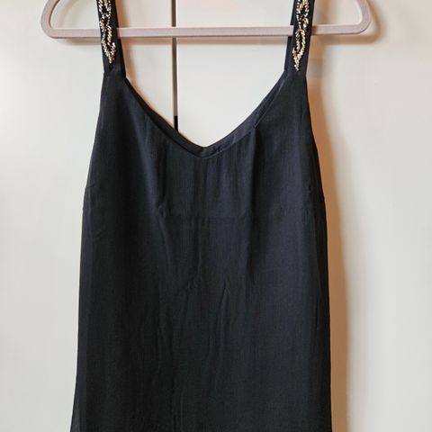 Singlet med detaljer