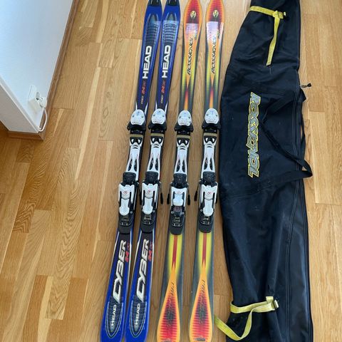 2 pairs of Skis: Rossignol (170cm) & Head (168cm)