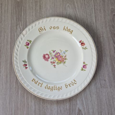 Vintage/gamle dekorative med teksten "Gi oss i dag vårt daglige brød".