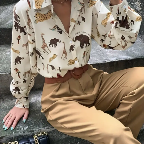 Elegant sofistikert bluse med Afrika motiv. .. nydelig og Unik stil .. NY