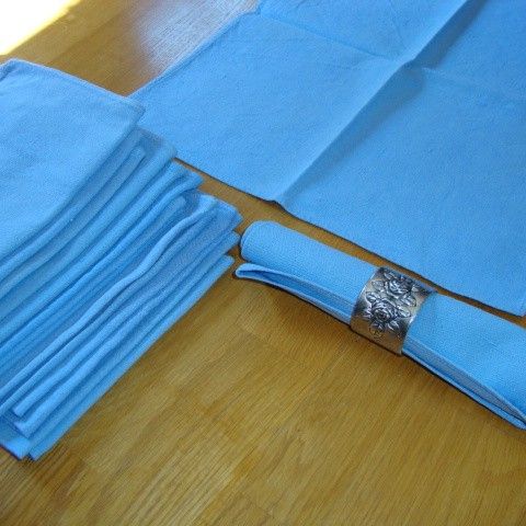 16 lyseblå servietter i bomull