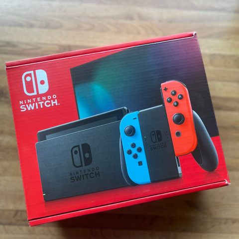 Helt ny uåpnet Nintendo Switch spillkonsoll with neon Joy-Con kontrollere