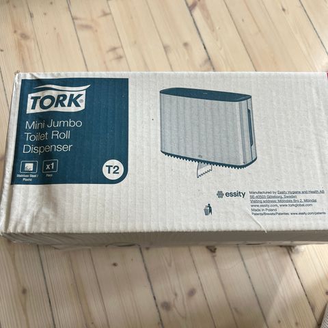 Tork holder for toalettrull