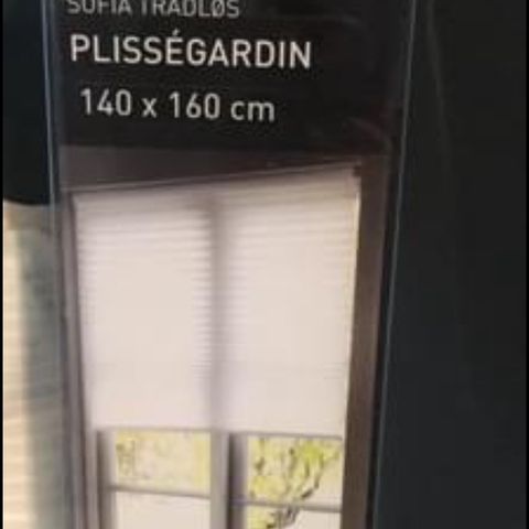 lysfiltrerende plissègardin hvit