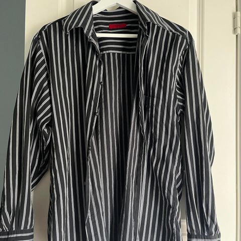 Black shirt with white stripes