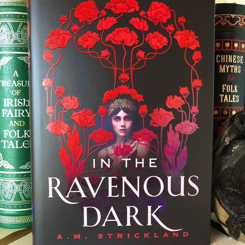 In the Ravenous Dark by A.M. Strickland