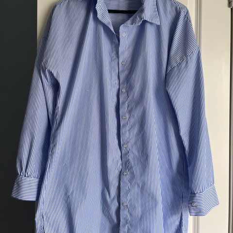 White shirt with blue stripes