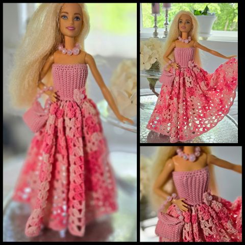 Hånd heklet unike kjoler til Barbie og klær til Ken. Flott gave!!