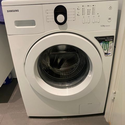 Fult brukende vaskemaskin