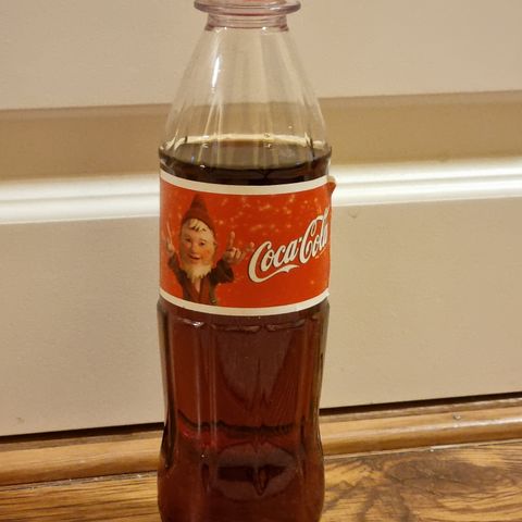 Coca-Cola flaske med "Satan" Nissen