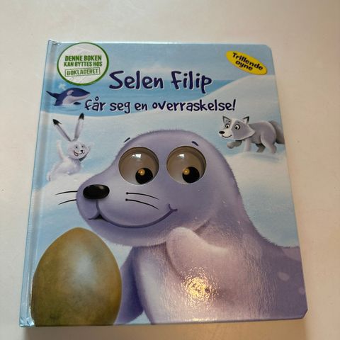 Barnebok. Selen, med trillende øyne.