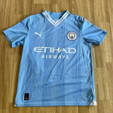 Man city fotballdrakt