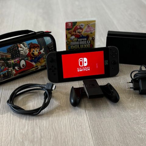 Nintendo Switch med 1 spill + oppbevaringsboks selges billig!!