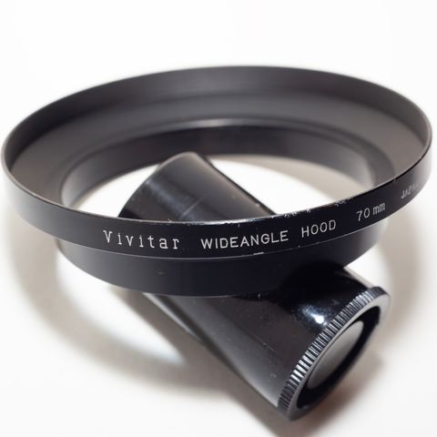 Vivitar lens hood 70mm «clamp on» - Kr 100,-