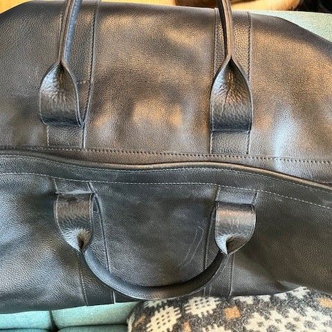 Lotuff black leather "Traveler" duffel, designed by Frank Clegg