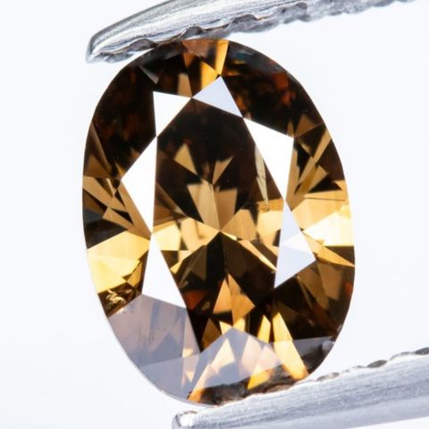 Natural Fancy Dark Yellowish Orangy Brown Diamond. 0,59 Ct.