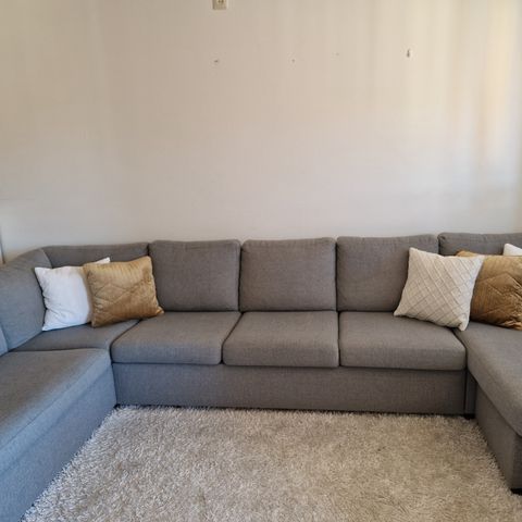 Pent brukt grå U sofa