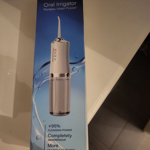 Oral irrigator