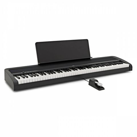 Korg B2 digitalt piano med innebygde høytalere og bag